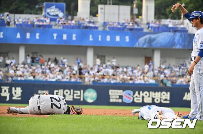채은성, 양도근과 1루 충돌로 교체