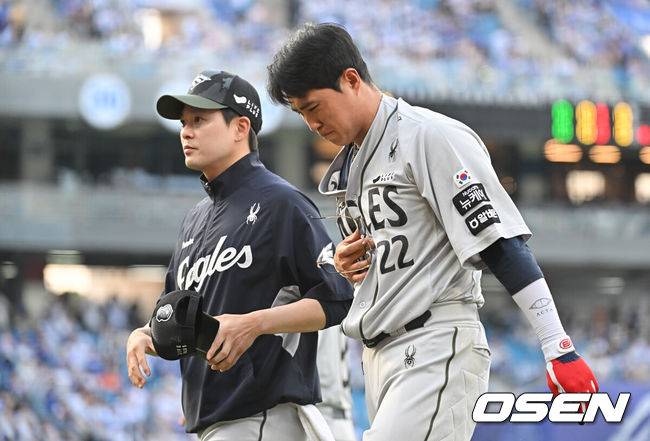 채은성, 양도근과 1루 충돌로 교체