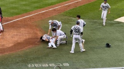 '포수와 홈 충돌' 데굴데굴 구를 정도로 아파한 김재환, 일단 병원 검진 계획 無→교체 예정 [MD잠실]